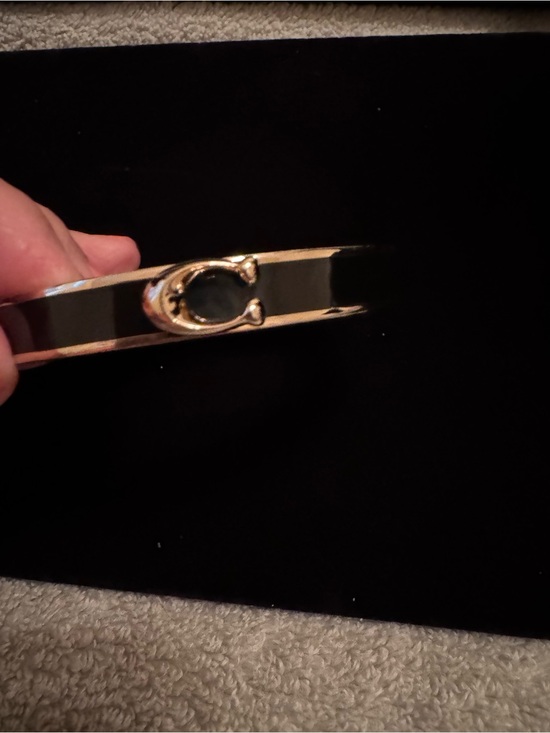Coach Accessories - Coach Gold-Tone Bangle with Black Enamel Accent